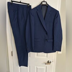 Blue Calvin Kline suit. Worn less than 5 times.